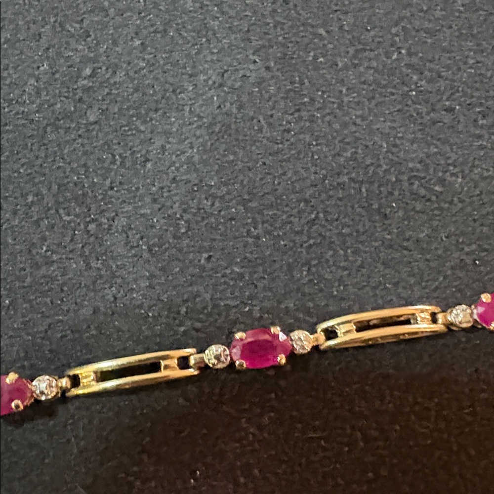 Yellow gold 10K ruby and diamond bracelet offers could be accepted